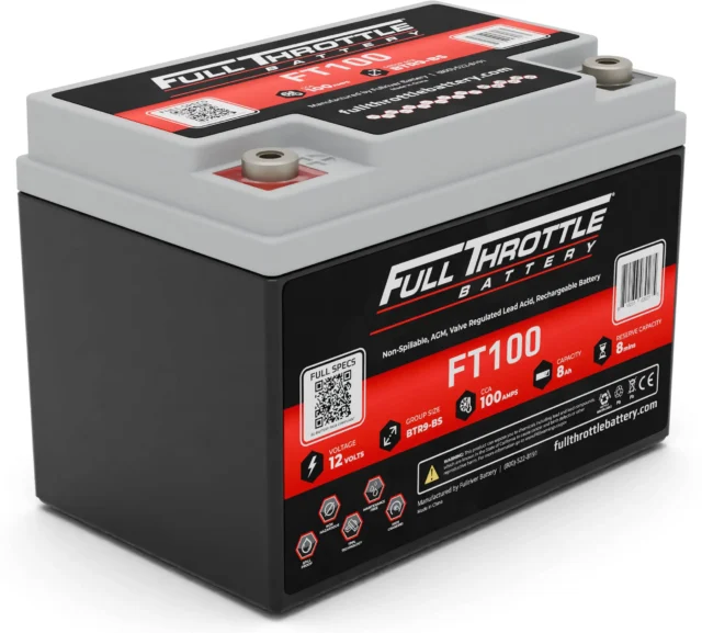 A Full Throttle FT100 battery with black casing and red labels, showing specifications and 12 volts, 100 amp-hours capacity on the label.