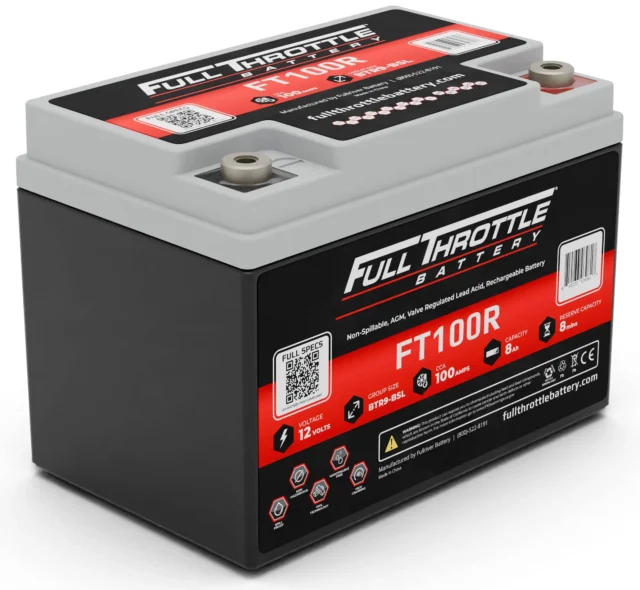 Full Throttle FT100R battery, 12 volts, 100 amp hours. Black and gray casing with red and white labeling, including specifications and safety icons.