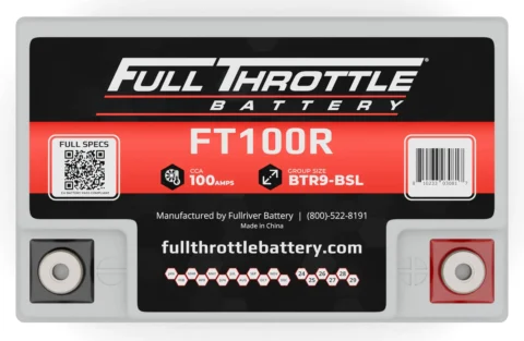 Close-up of a car battery labeled "Full Throttle Battery" with model number FT100R, showing specifications and a QR code for full specs.