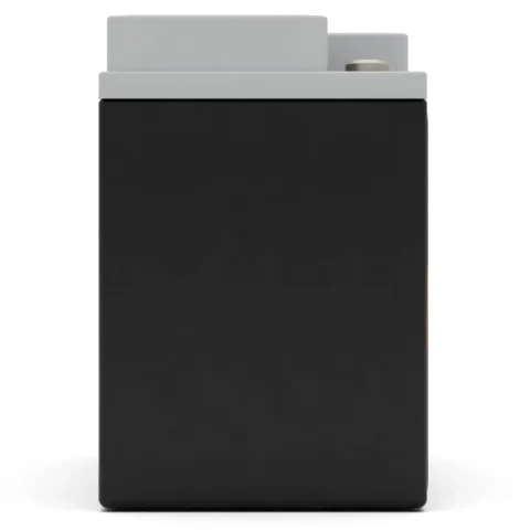 Close-up of a black and gray rectangular battery pack with smooth edges, viewed from the side.