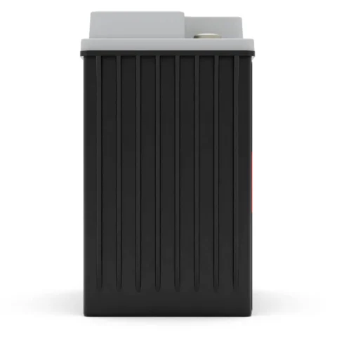 A black, rectangular container with vertical grooves and a gray top viewed from the front.