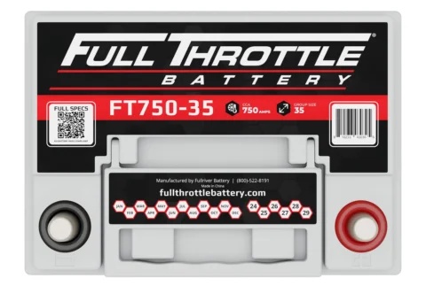 Car battery labeled "Full Throttle FT750-35" with red and black design, showing specifications including 750 amps and size 35, along with contact information.