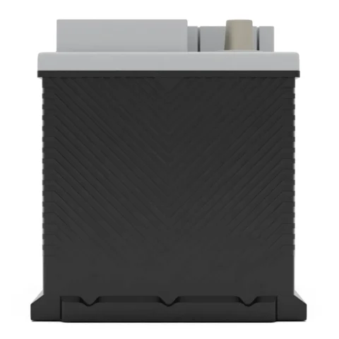 A large, rectangular, dark-colored battery with a light gray top and visible terminals on the right side.