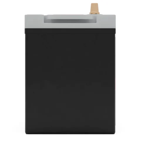 A tall, rectangular black battery with a gray top and a small gold terminal on the upper right corner.