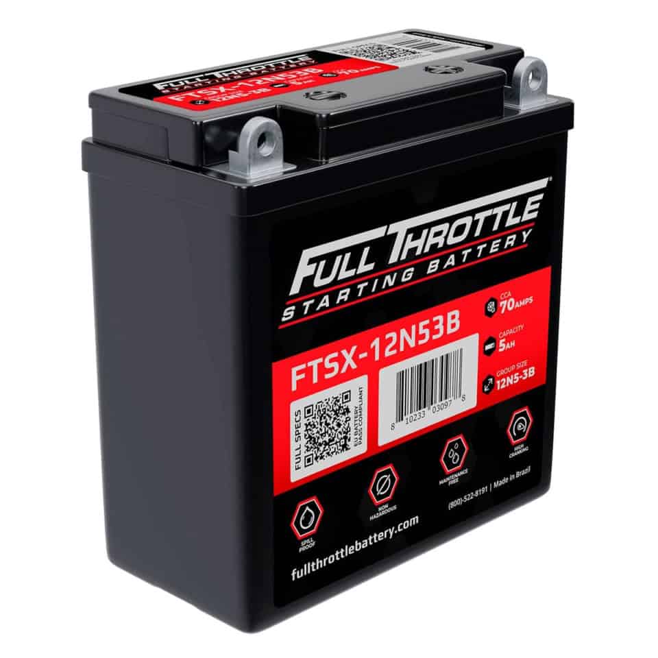 A black Full Throttle starting battery, FTSX-12N53B, showing its capacity of 5Ah and 70 CCA. The battery features labels with technical details and QR codes.