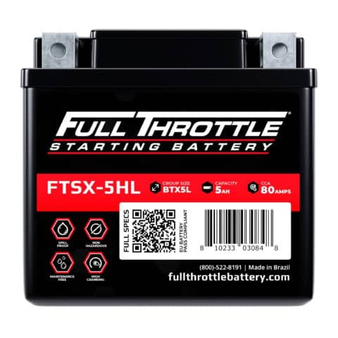 Close-up of a Full Throttle starting battery, model FTSX-5HL, showing specifications and a barcode.