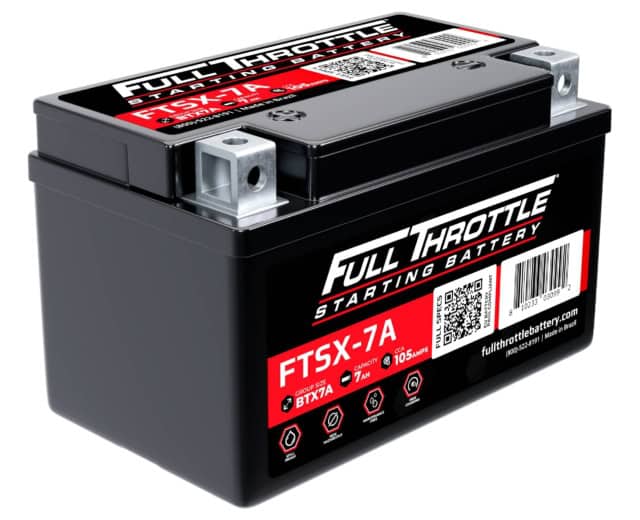 A black Full Throttle starting battery, model FTX-7A, with red and white label design, featuring a QR code and specifications for 12V, 7Ah, 105 amps.