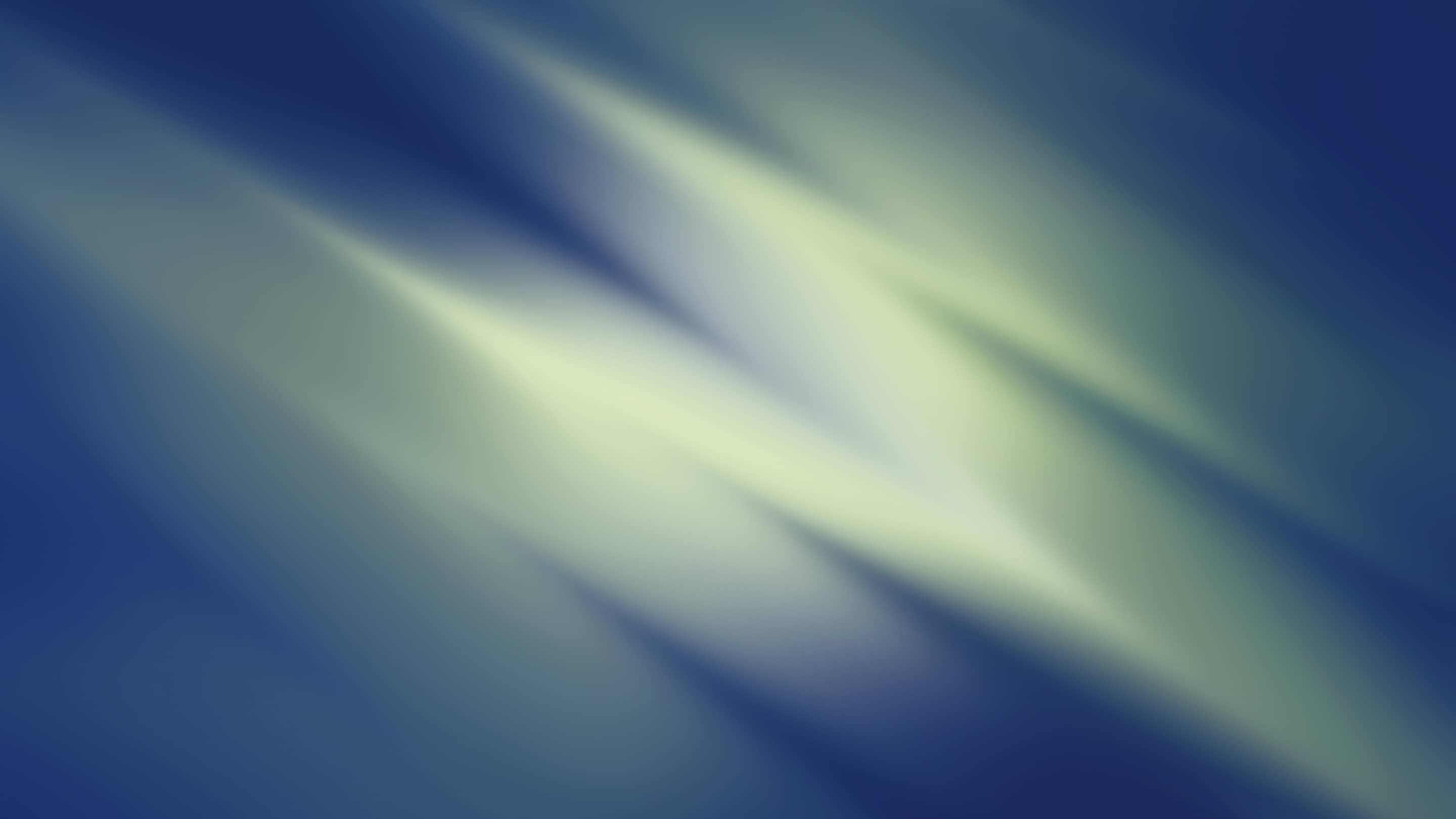A blue and green blurred background.