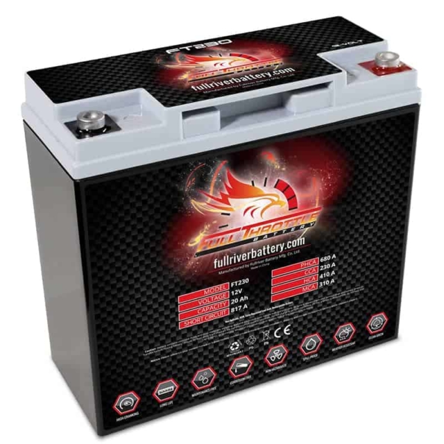 A motorcycle battery with a red flame on it.