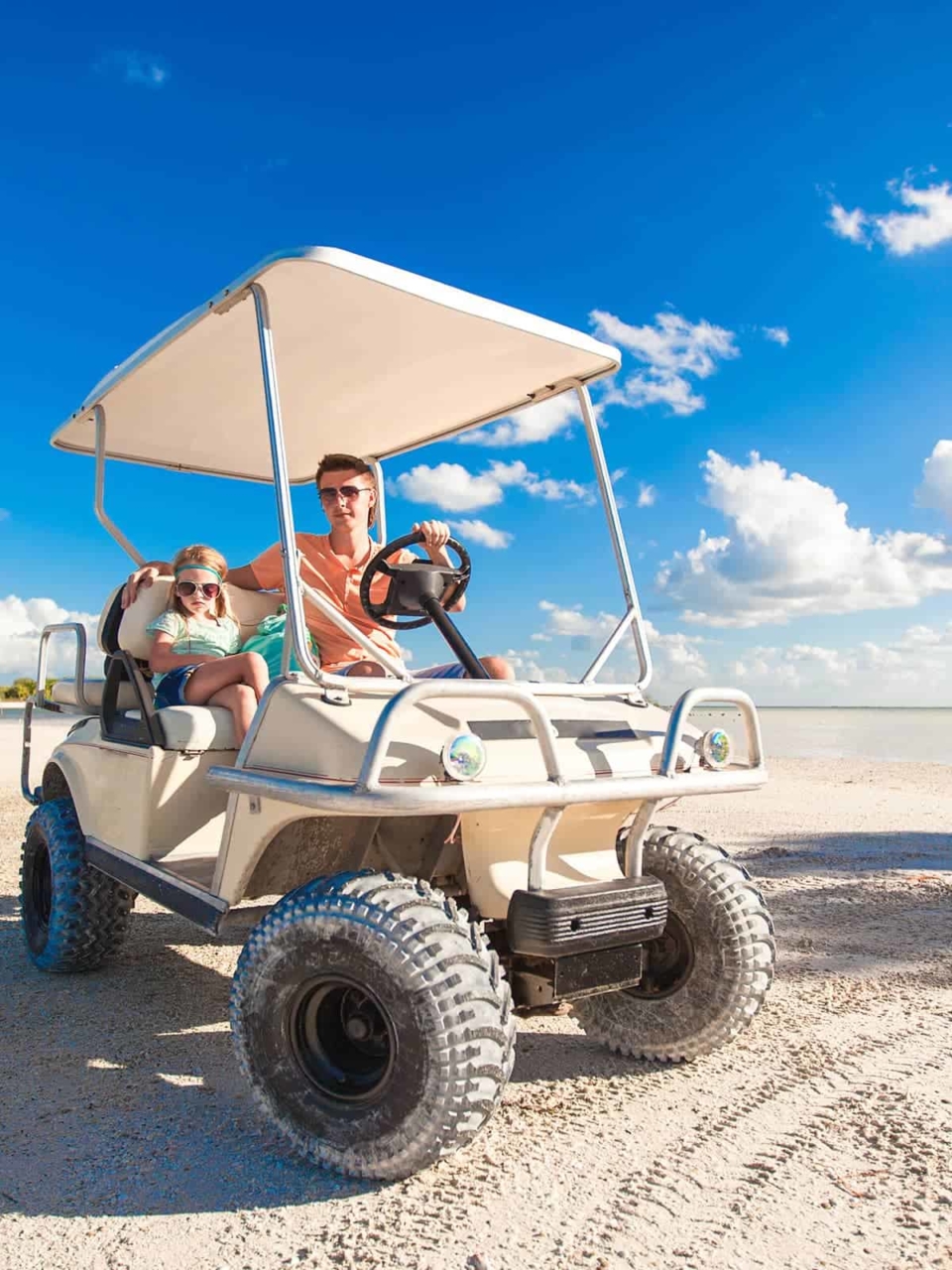 Custom off-road golf cart on a beach