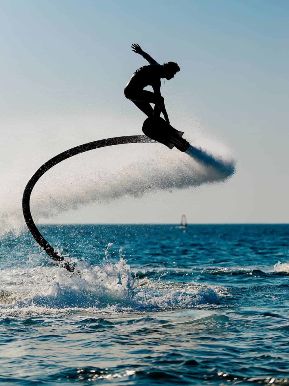 Man riding a flyboard in the ocean