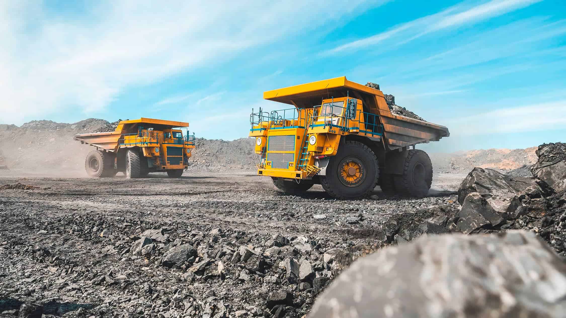 Mining vehicles and equipment working the land