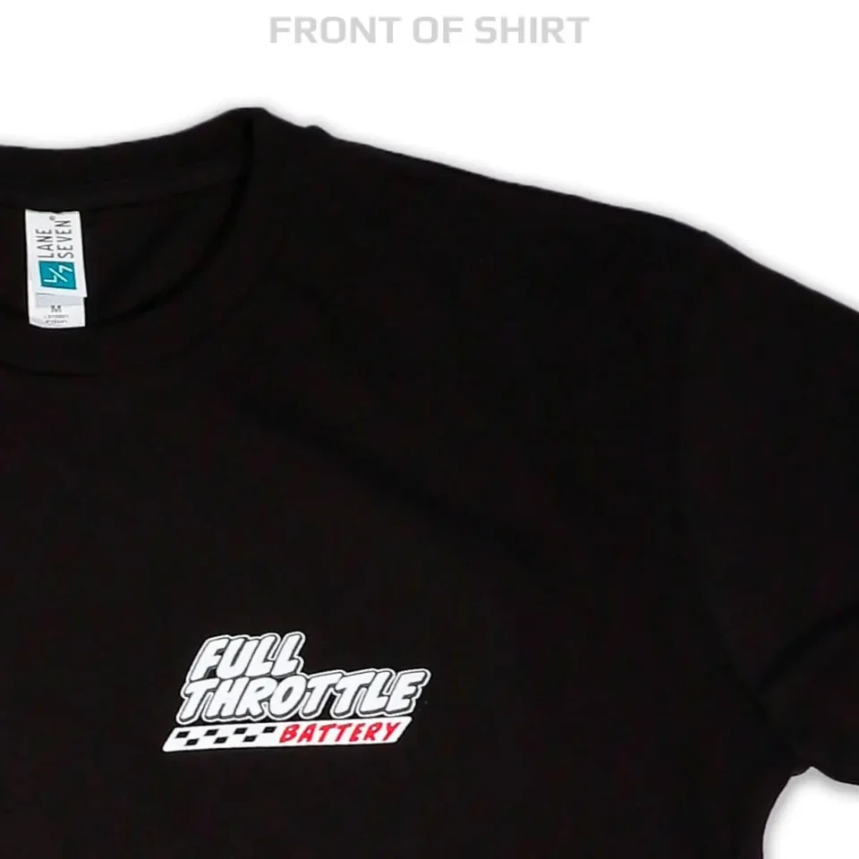 Close-up of a black Nissan Shirt with a "Full Throttle Battery" logo featuring a stylized racing flag design on the left side. The shirt is labeled as size medium by "Lake Series.