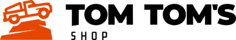 Logo of Tom Tom's Shop featuring an orange stylized truck over an orange shape with the text "TOM TOM'S SHOP" in black.